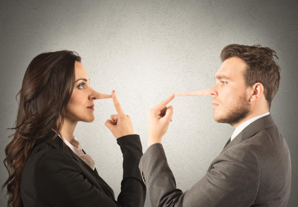 Concept of lie with couple with long nose